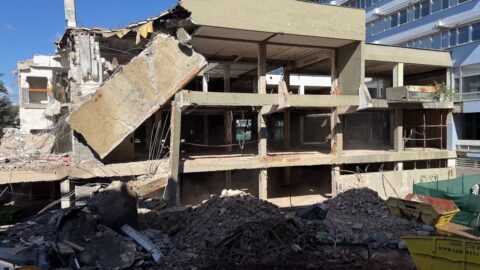 Partially Demolished Building with Rubble Piles