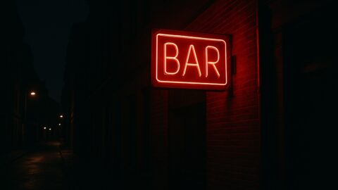 Red Neon Bar Sign at Night