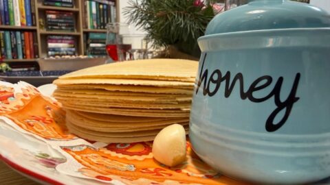 Honey Jar With Wafer Sheets On Festive Table