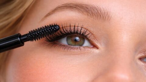 Applying Black Mascara on Long Eyelashes