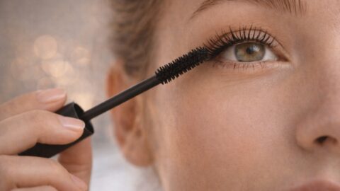 Applying Mascara on Eyelashes Close Up