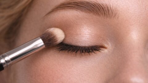Applying Neutral Eyeshadow With Makeup Brush