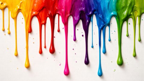 Rainbow Paint Drips On White Canvas