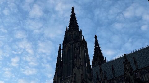 St Vitus Cathedral Spire Against Cloudy Sky