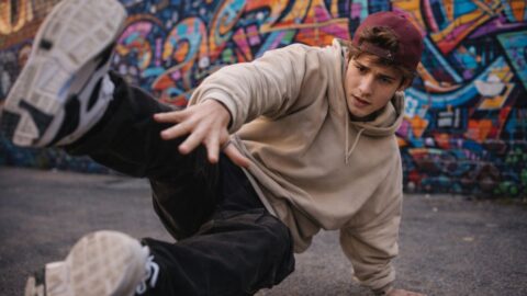 Teen Breakdancer in Front of Graffiti Wall