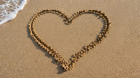 Heart Drawn in Wet Beach Sand